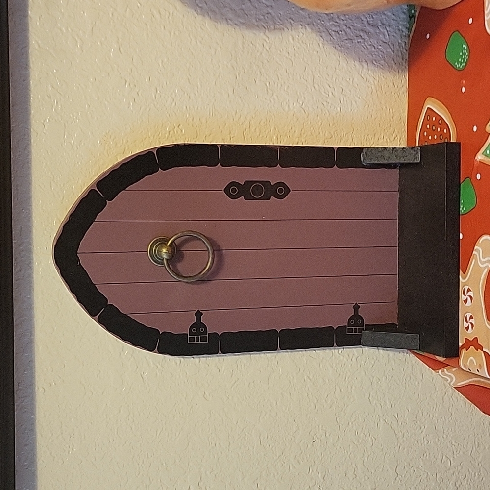 Mauve and black wooden door